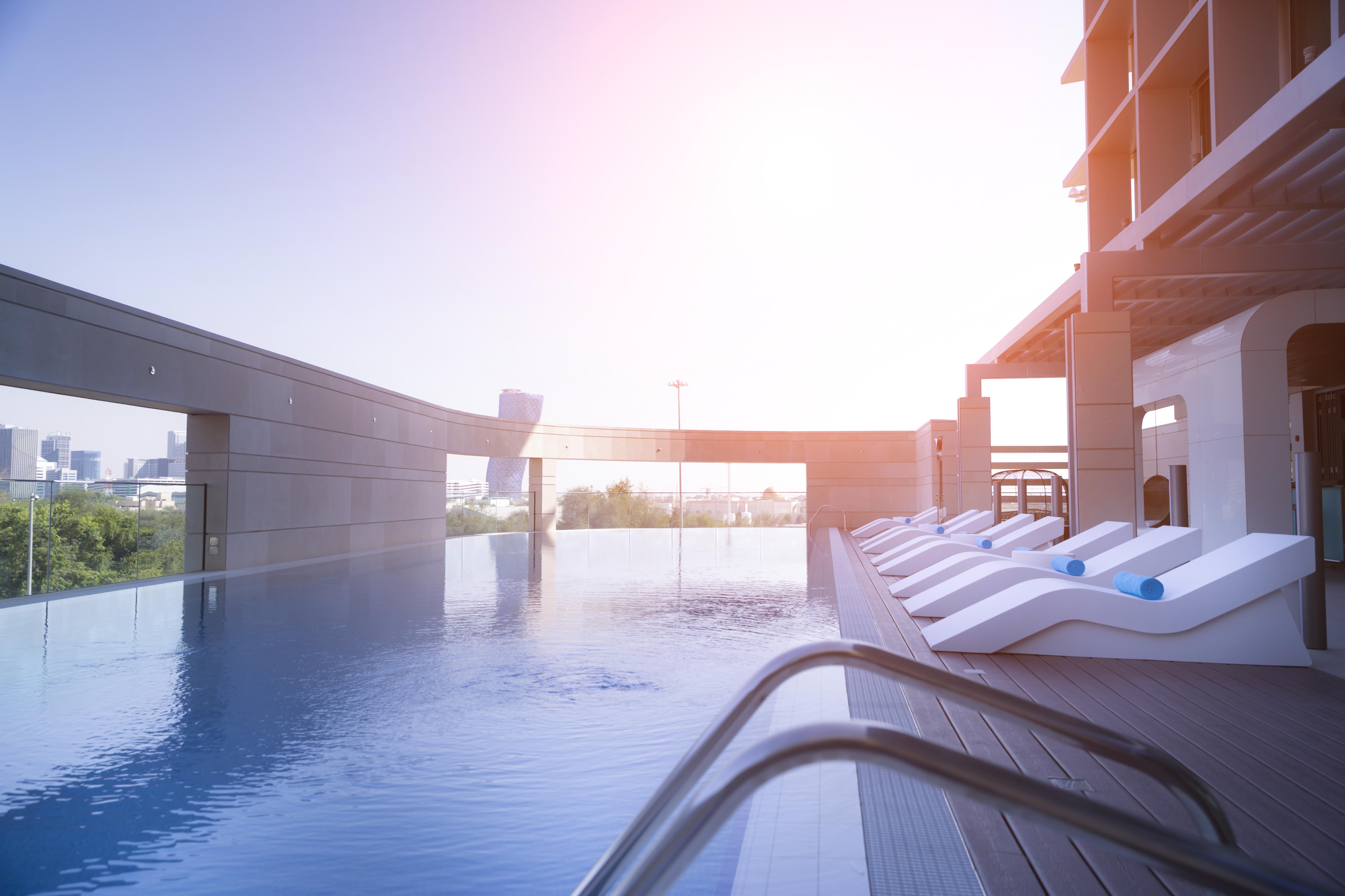 Novotel Abu Dhabi Al Bustan Exterior foto Swimming pool at the hotel