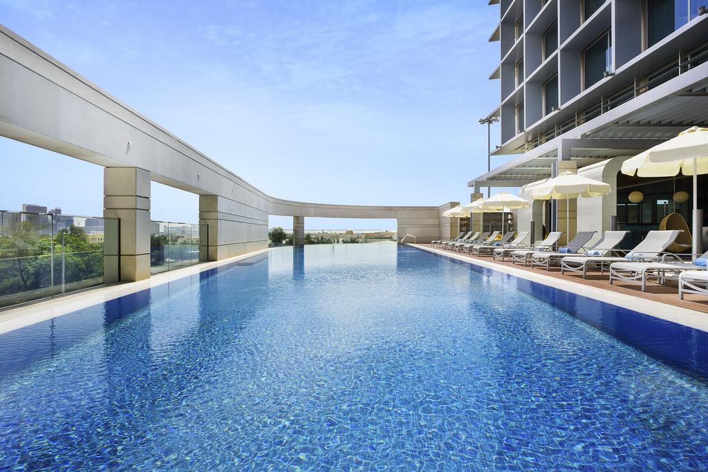 Novotel Abu Dhabi Al Bustan Exterior foto Swimming pool